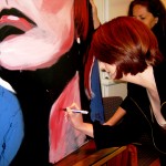 Prime Minister Julia Gillard signs her speed painting